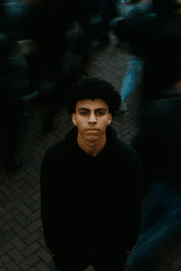 Top 15 ChatGPT Image Prompts That Went Viral on Instagram Standing Alone in Crowd